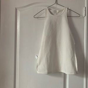 Sleeveless white too. Brand new.